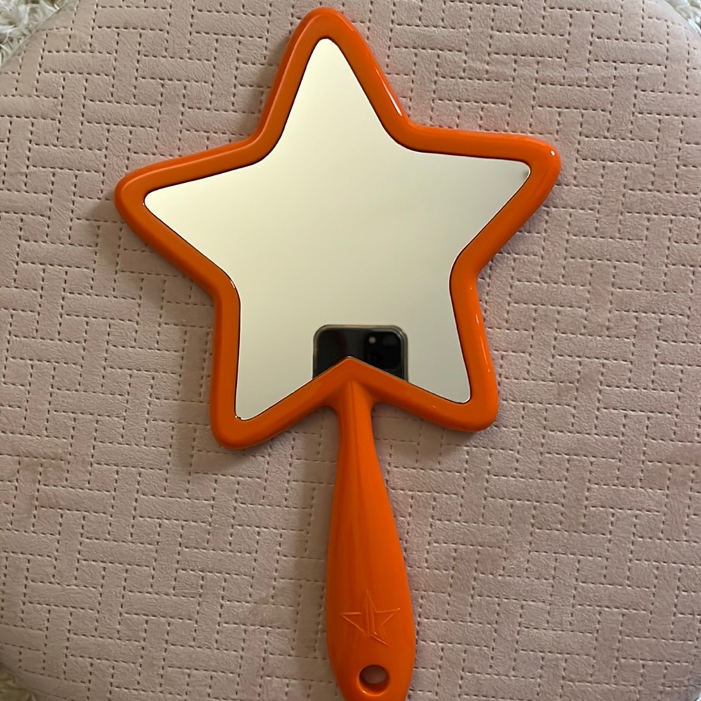 Jeffrey Star Hand held mirror, opened but never used